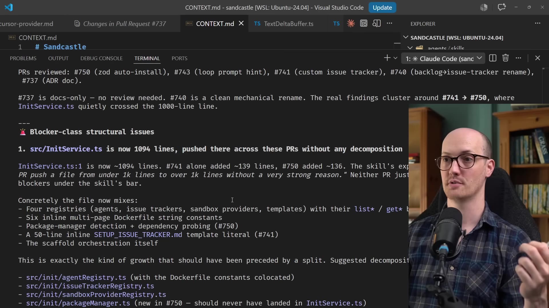The review output: PRs reviewed and the InitService.ts blocker finding