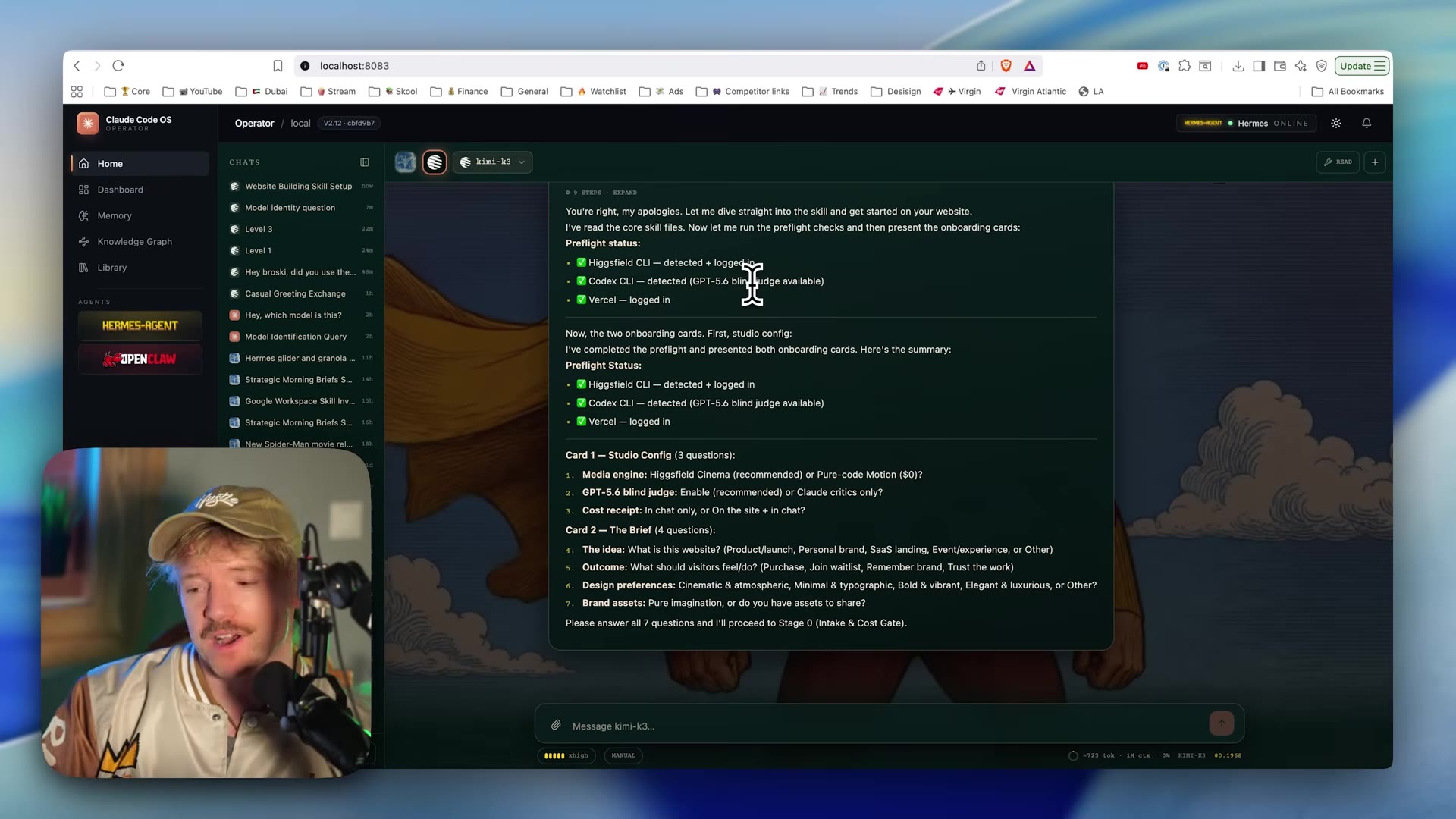 Claude Code OS chat showing pre-flight status (Higgsfield CLI logged in, Codex CLI with GPT-5.6 blind judge available, Vercel logged in) and two onboarding cards: Studio Config (3 questions) and The Brief (4 questions), ending at "Stage 0 (Intake & Cost Gate)".