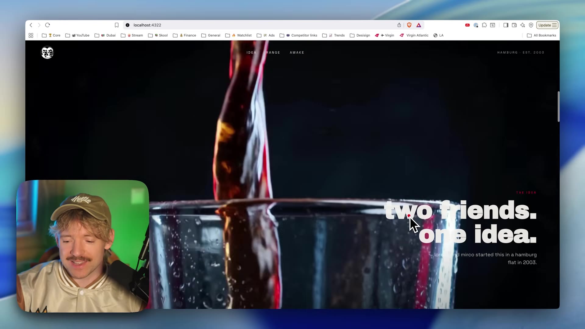 Generated Fritz Cola site (localhost:4322): nav IDEA / RANGE / AWAKE, "Hamburg · Est. 2003", hero "two friends. one idea." over a cola-pour video, with placeholder body copy.