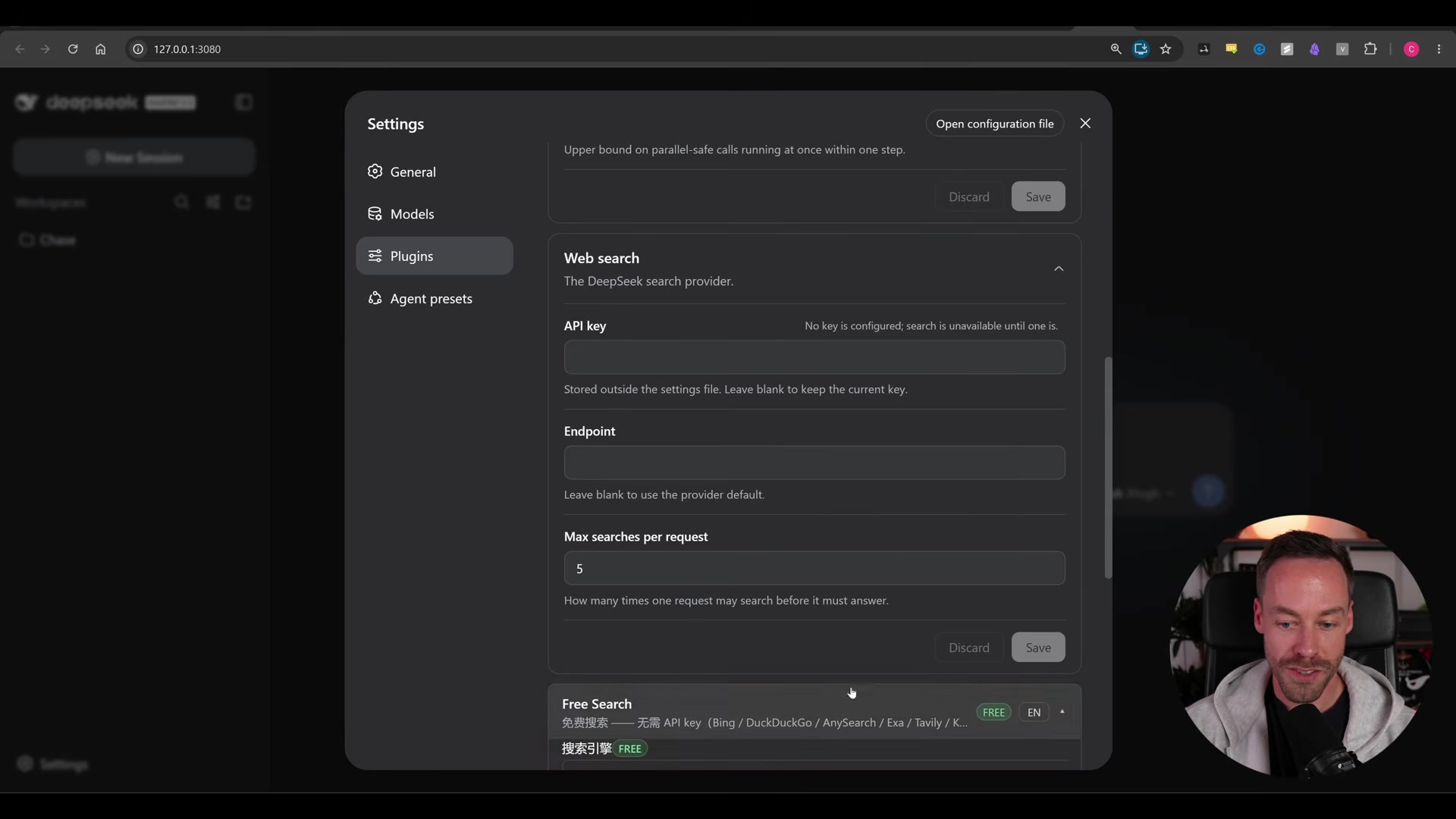 Settings > Plugins > Web search panel showing "No key is configured; search is unavailable until one is" for the DeepSeek search provider, with the community Free Search plugin listed below it
