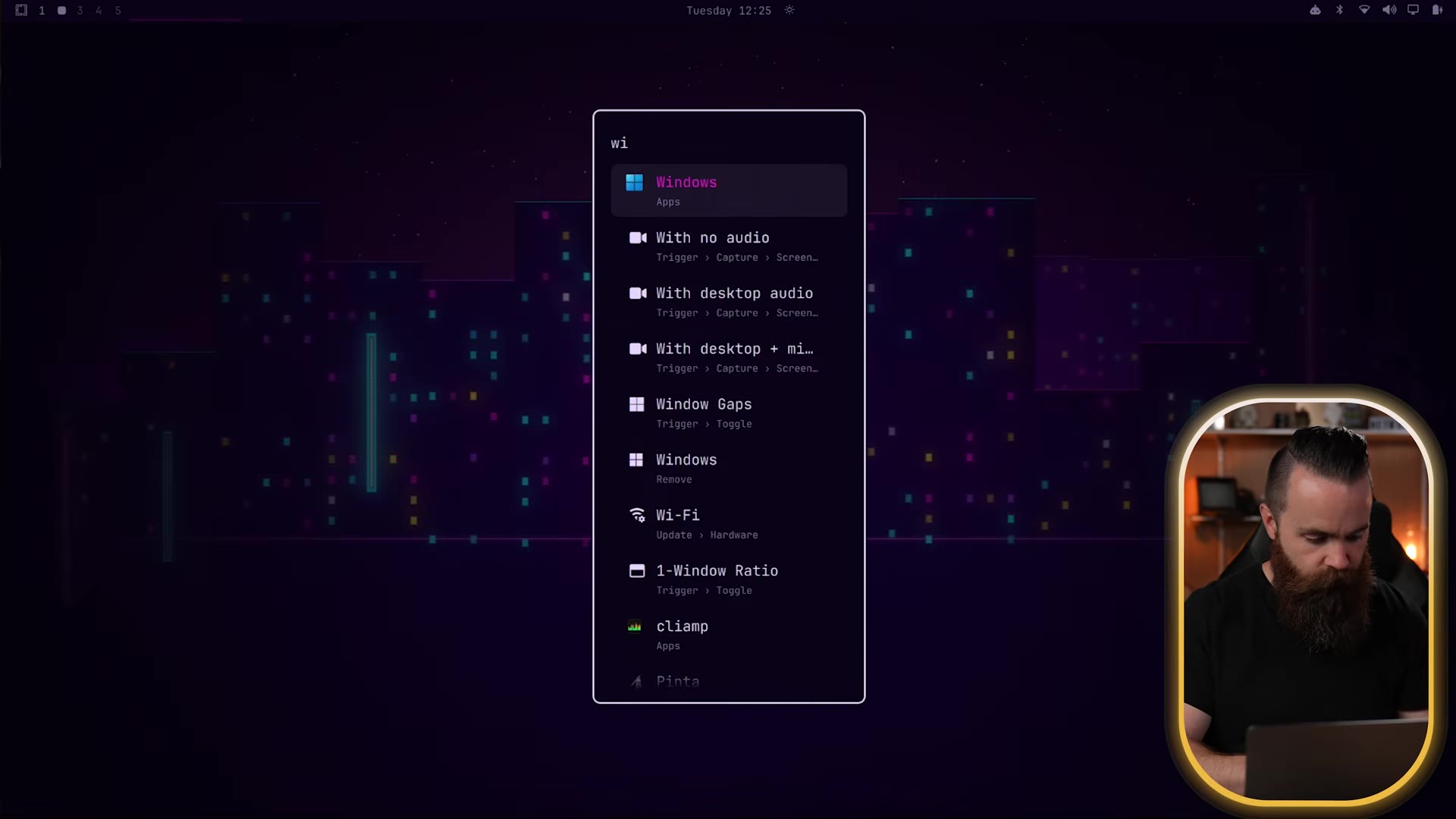 The resulting cyberpunk-riced desktop and the Omarchy app launcher